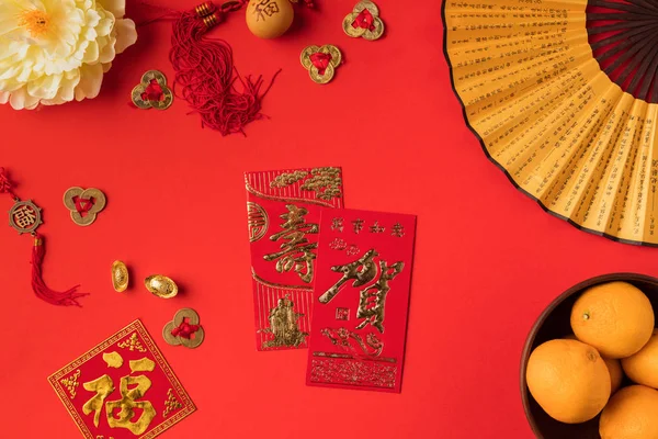 Chinese decorations and tangerines — Stock Photo