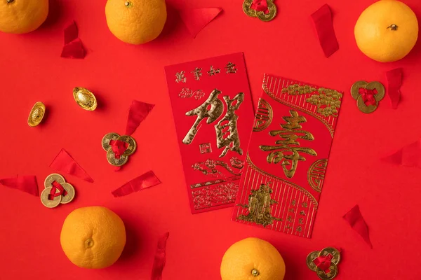 Chinese decorations and tangerines — Stock Photo