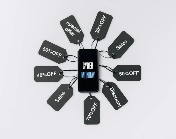 Smartphone e etiquetas em branco — Fotografia de Stock