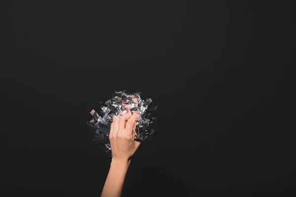 Woman holding confetti in hands — Stock Photo