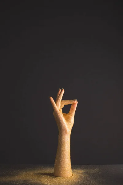 Wax hand in sequins — Stock Photo