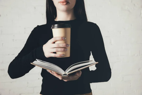 Woman with coffee reading book — Stock Photo
