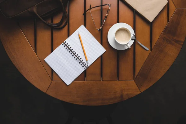 Notepad with pencil and coffee — Stock Photo