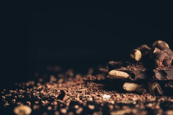 Pile of chocolate with nuts pieces — Stock Photo