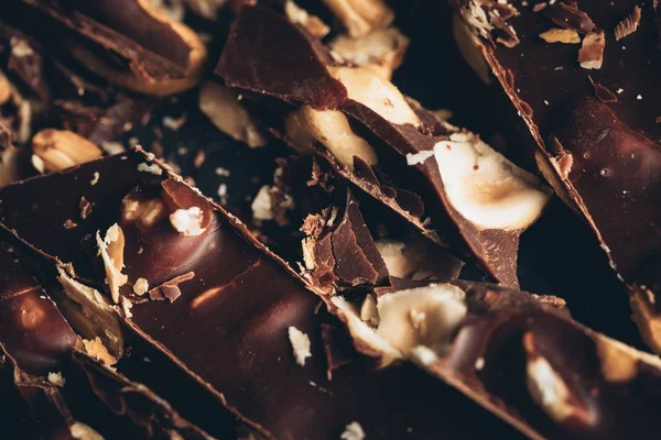 Crushed chocolate with nuts — Stock Photo