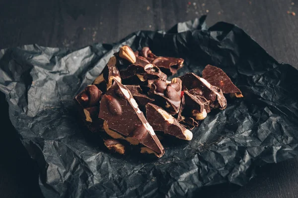Dark chocolate with nuts — Stock Photo