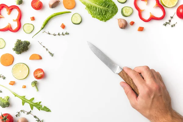 Man putting knife on table — Stock Photo