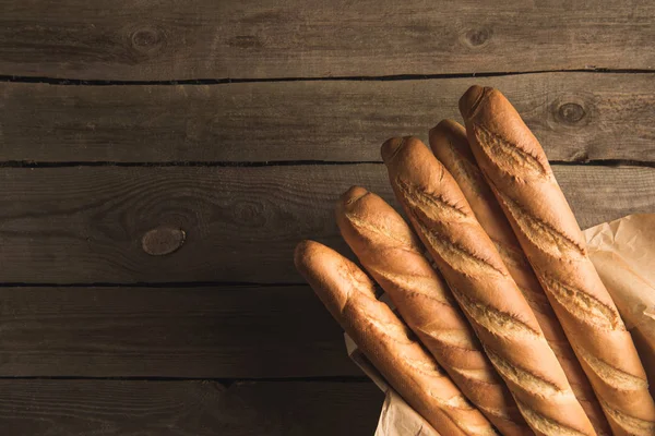 Fresh baguettes in box — Stock Photo