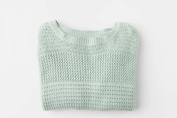 Trendy light blue knitted sweater — Stock Photo