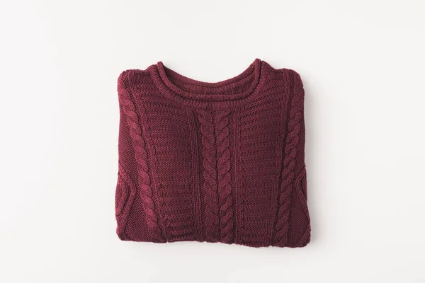 Knitted burgundy sweater — Stock Photo