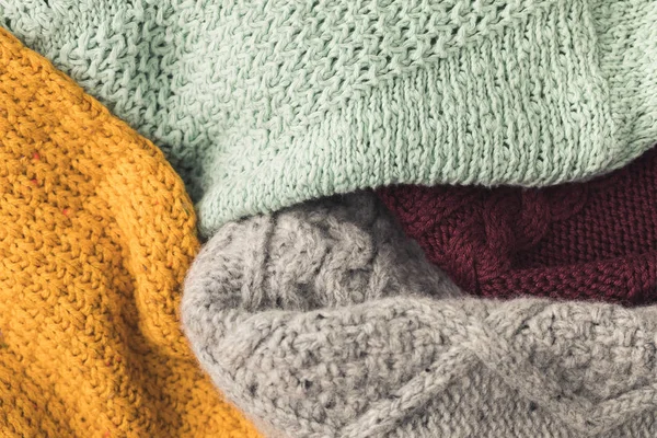 Warm knitted sweaters — Stock Photo