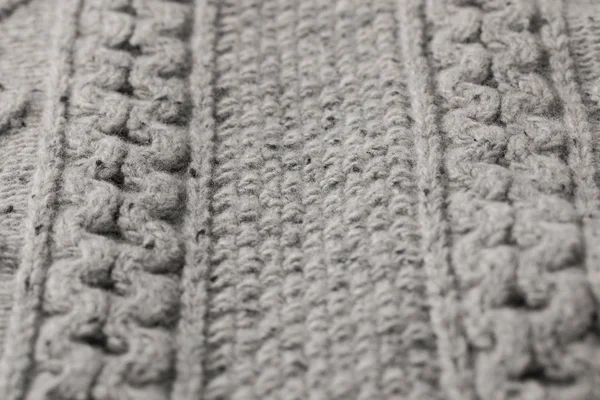 Текстура сірого светра з візерунком — стокове фото