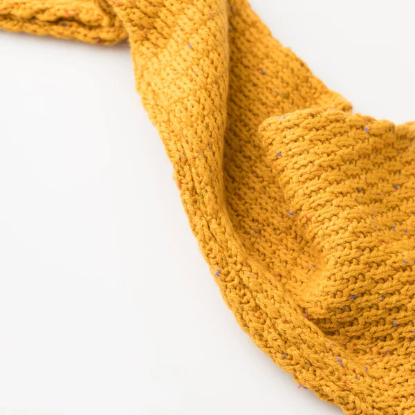 Top view of sleeve of yellow knitted sweater, isolated on white — Stock Photo