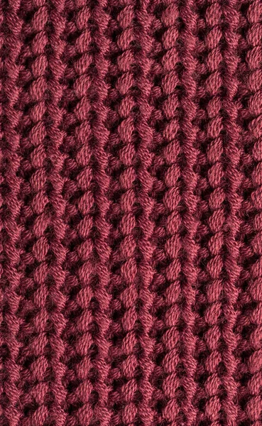 Вязаный бордовый свитер — стоковое фото