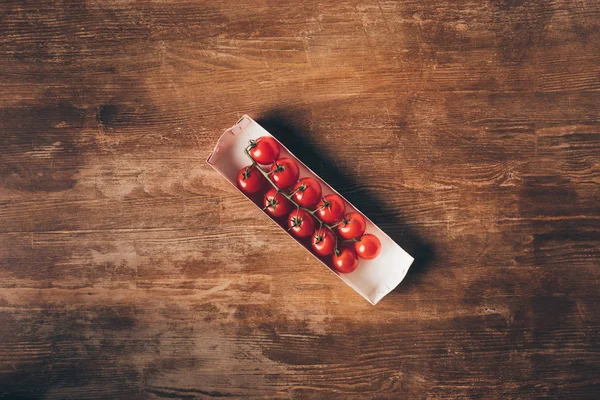 Top view of Cherry tomatoes on wooden table — Stock Photo