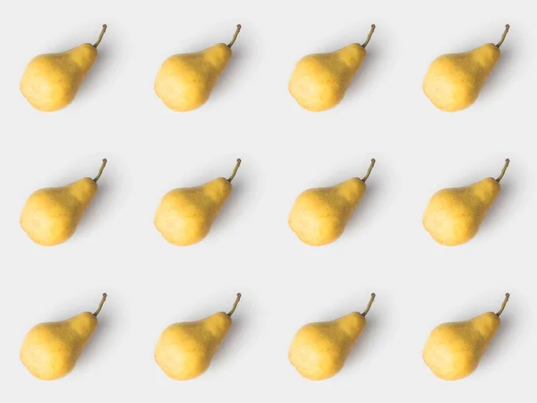 Pattern of delicious pears isolated on white — Stock Photo