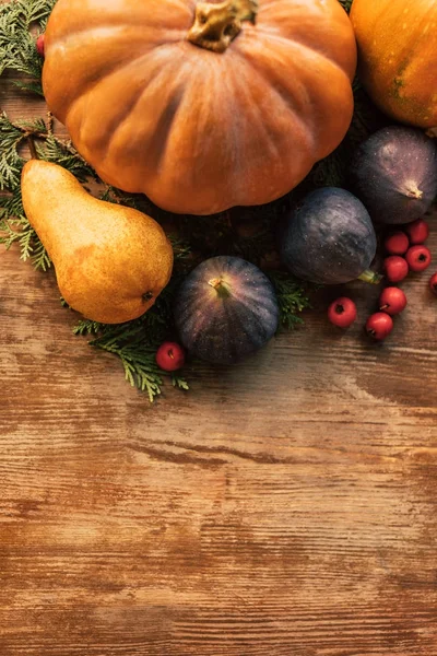 Top view of various fruits and vegetables on wooden table — Stock Photo