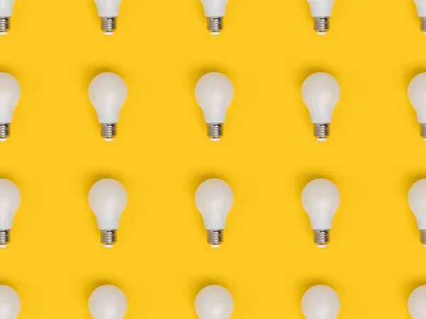 Marco completo de disposición de bombillas aisladas en amarillo - foto de stock
