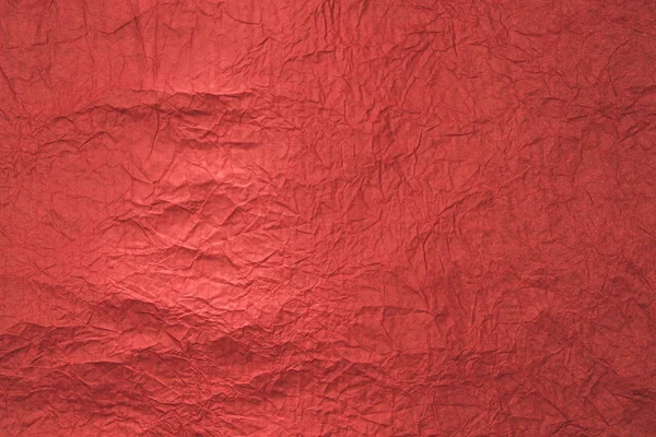 Vue rapprochée de la texture du papier d'emballage rouge — Photo de stock