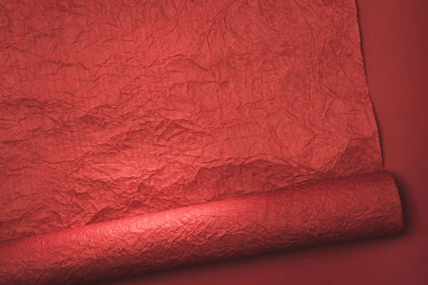 Vista de cerca de la textura de papel de embalaje rojo - foto de stock