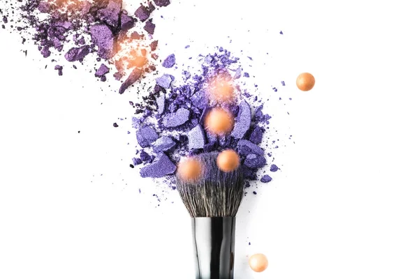 Top view of cosmetic brush with purple powder on isolated on white — Stock Photo