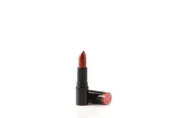 Single tube of red lipstick isolated on white — Stock Photo