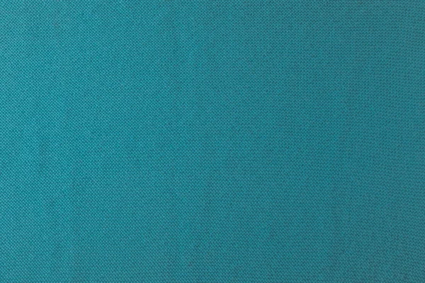 Vue rapprochée de la texture du tissu turquoise — Photo de stock