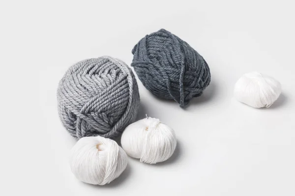 Grey and white yarn balls isolated on white — Stock Photo