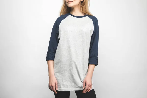 Cropped shot of woman in stylish long sleeve on white — Stock Photo