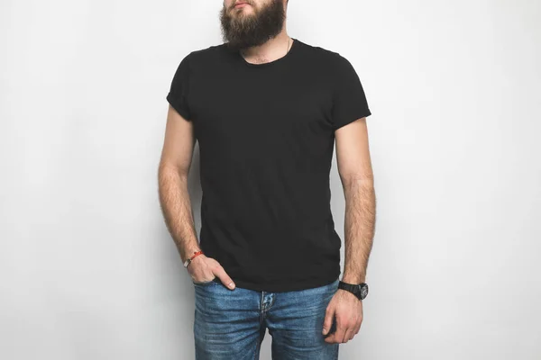 Cropped shot of man in black t-shirt isolated on white — Stock Photo