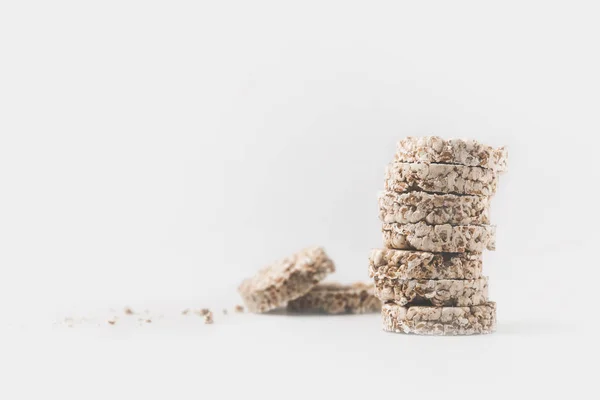 Stack of healthy rice cakes isolated on white — Stock Photo