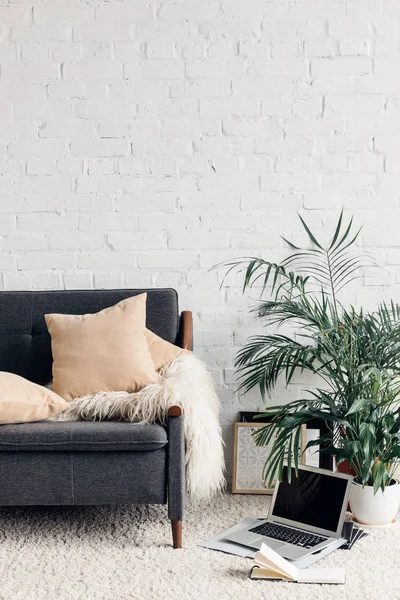 Comfy couch in white living room interior with brick wall, mockup concept — Stock Photo