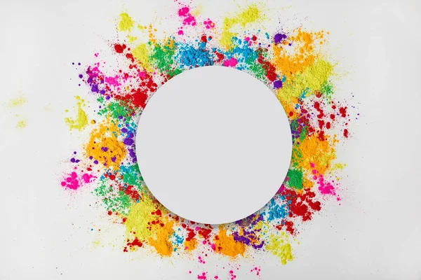 Circle frame of colorful traditional powder, isolated on white, traditional Indian festival of colours — Stock Photo