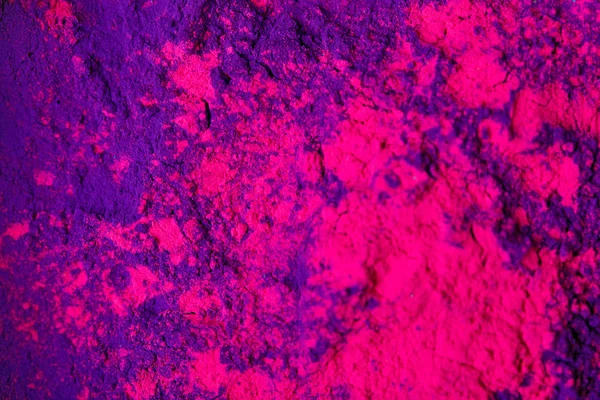 Top view of purple and pink holi powder, traditional Indian festival of colours — Stock Photo