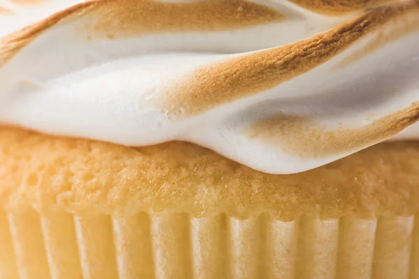 Close up view of sweet cupcake with meringue isolated on white — Stock Photo