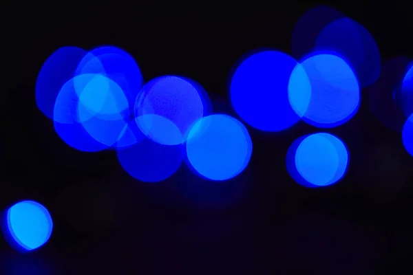 Abstract dark blue bokeh background — Stock Photo