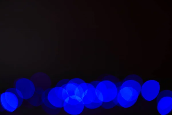 Abstract dark blue bokeh texture — Stock Photo