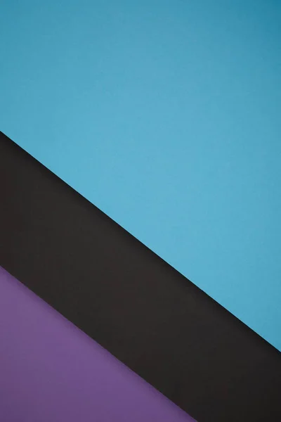 Fond géométrique bleu, noir et violet de papier coloré — Photo de stock