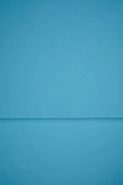 Bright blue abstract background from colored paper — Stock Photo