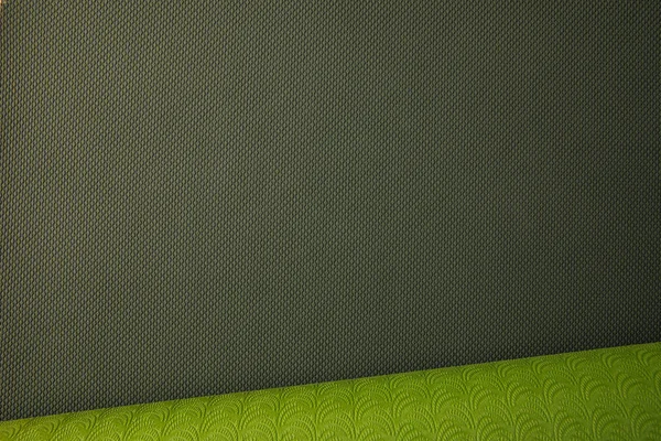 Vista superior do tapete de ioga laminado verde — Fotografia de Stock