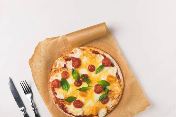 Top view of appetizing tasty homemade pizza on white — Stock Photo