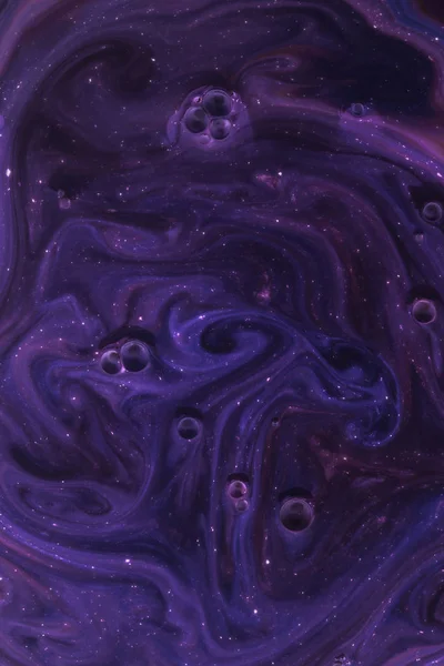 Abstract dark texture with purple paint and bubbles as space — Stock Photo