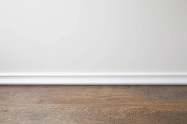 Parede branca e piso de madeira no apartamento — Fotografia de Stock