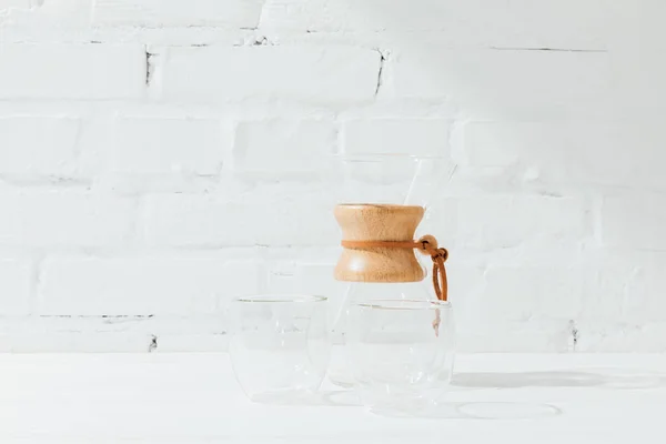 Closeup shot of empty glass mugs and chemex — Stock Photo