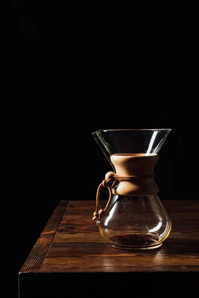 Alternative coffee in chemex on wooden table — Stock Photo