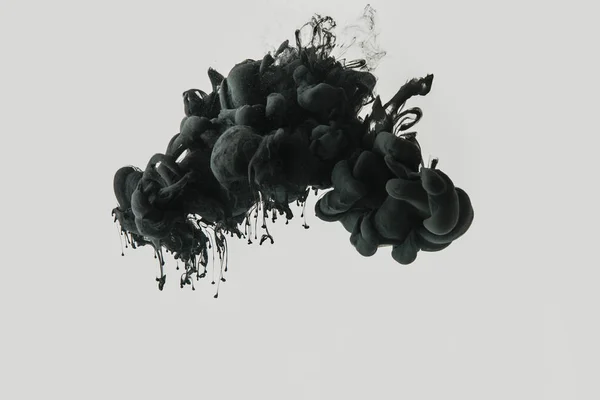 Close up view of black ink in water isolated on gray — Stock Photo