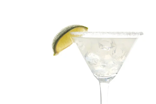 Close up view of margarita cocktail with lime piece and ice isolated on white — Stock Photo