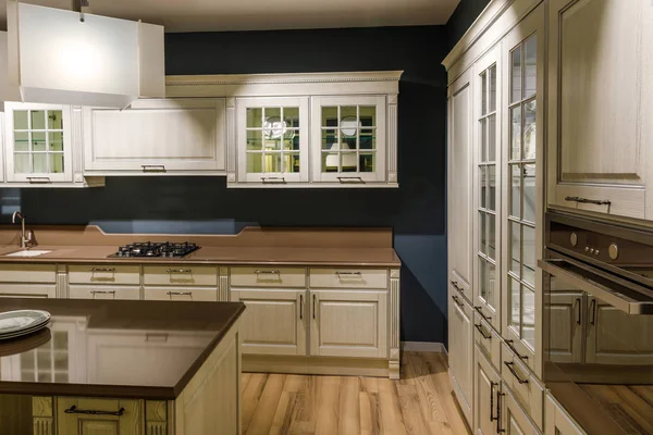 Stylish kitchen with elegant wooden counter — Stock Photo