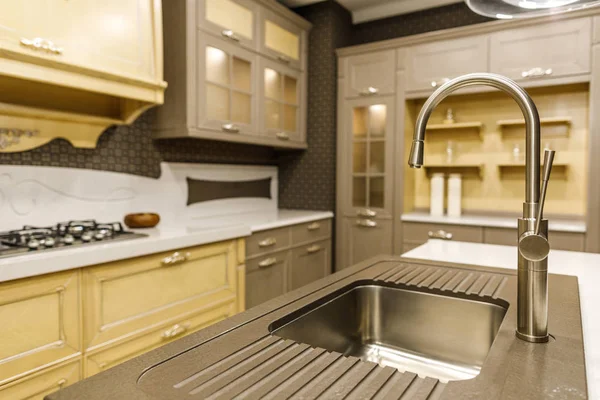 Close-up view of modern sink in renovated kitchen — Stock Photo