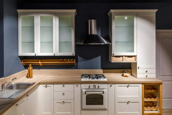 Stylish kitchen with vintage cabinets and stove — Stock Photo